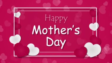 Pembe arka planda kalpleri olan anneler günün kutlu olsun.