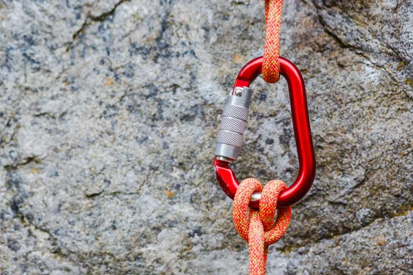 Red carabiner with rope — Stock Photo, Image