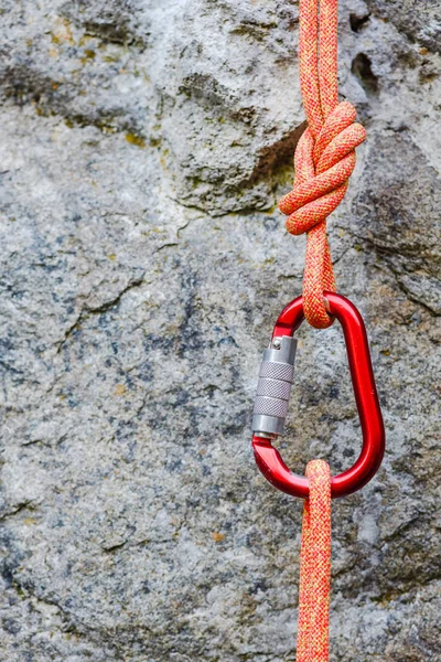 Red carabiner with rope — Stock Photo, Image