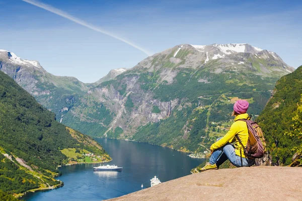 Picturesque Norway mountain landscape. Young girl enjoying the view near Geiranger fjord, Norway — Stock Photo, Image