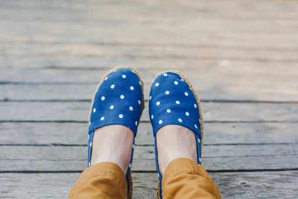 Woman\'s feet in a funny shoes