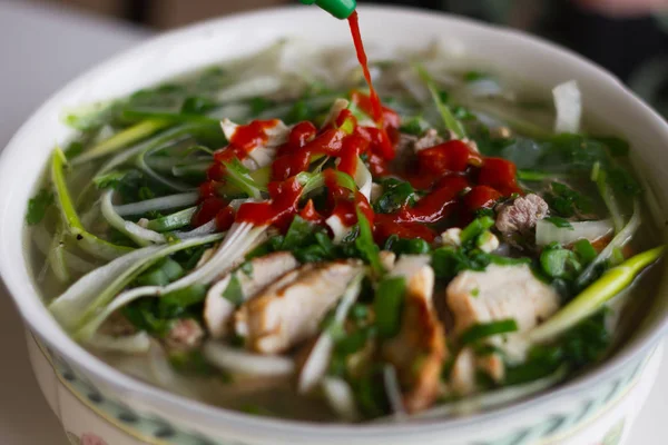 Bowl of Vietnamese beef noodle soup Pho Bo with spicy — Stock Photo, Image