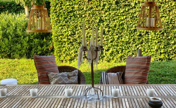 Elegant wooden garden furniture on terrace of suburban home — Stock Photo, Image