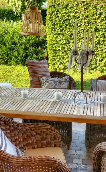 Elegant wooden garden furniture on terrace of suburban home — Stock Photo, Image