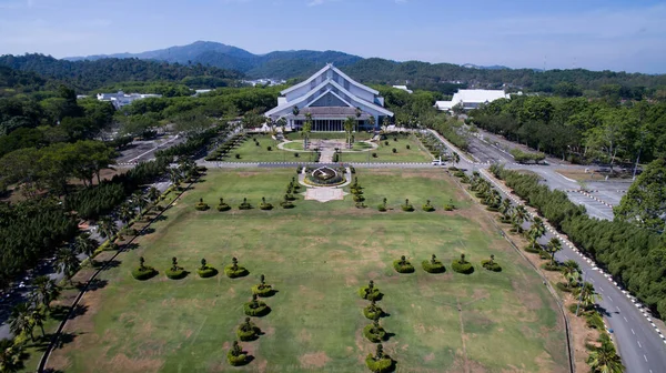 aerial view of campus main hall with green landscape