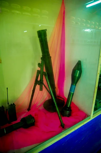 BETONG, THAILAND - Oct 10 2010: A collection of equipment used by the communists on display at Piyamit Tunnel which is a tourist attraction in Betong,