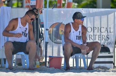 lANGKAWI, MALAYSIA - 13 MARCH 2020: K. Dunwinit and S. Prathip from Thailand vs Annerstedt and Johansson from Sweden during day 2 of the FIVB Beach Volleyball Wourld Tour Langkawi 2020 clipart
