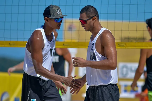 IANGKAWI, MALAYSIA - 13 Mart 2020: K. Dunwinit ve S. Prathip Tayland 'dan Annerstedt ve İsveç' ten Johansson 'a karşı FIVB Beach Voleybol Dünya Turu Langkawi 2020