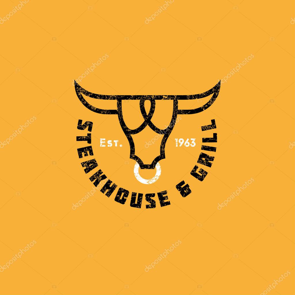Logo steak house. Meat restaurant or butchery emblems. The stylized head of a bull and letters.