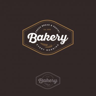 Spikelet ekmek logolu. Ekmek ve pişirme amblemi. Vintage ekmek logosunu görmeniz gerekir. Karanlık bir arka plan üzerinde altın ve beyaz yazıt.