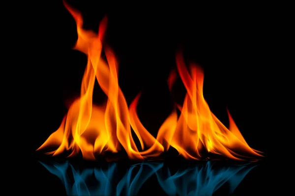 Fire flames on a black background blur detail isolated — Stock Photo, Image