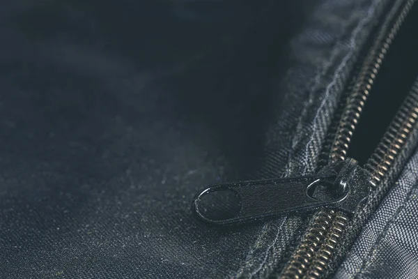 Closeup zipper on a black bag — Stock Photo, Image