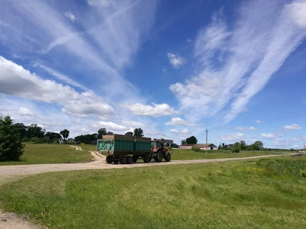 truck moving in rural scene in bright sunlight