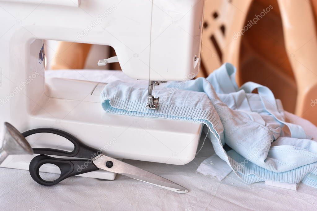 Sewing machine cloth and scissors work place