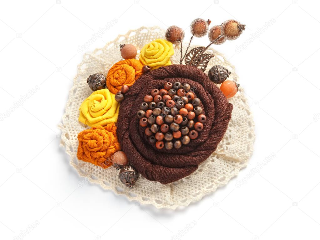 Stylish handmade brooch consisting of brown flowers from fabric 