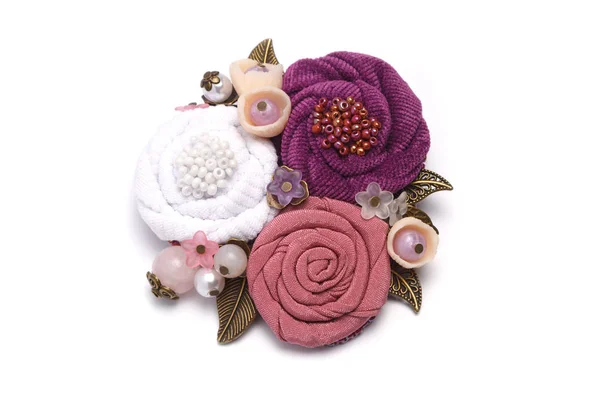 Brooch handmade consisting from of white, pink and lilac flowers making from cloth — Stock Photo, Image