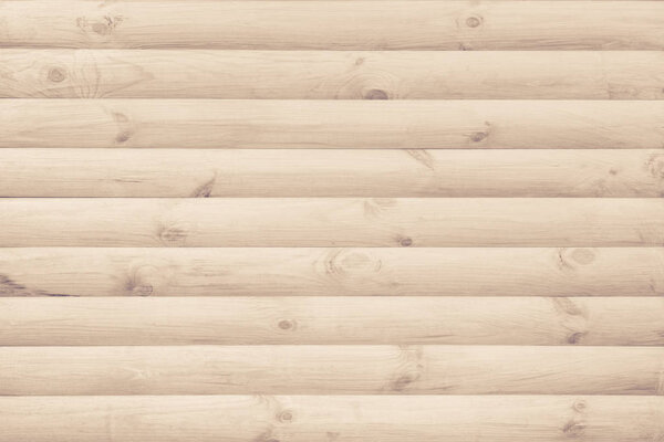 Стена облицована современной натуральной круглой неокрашенной древесиной в качестве фона
