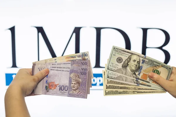 Malesia ringgit con sfondo bianco indicazione corruzione di 1MDB — Foto Stock