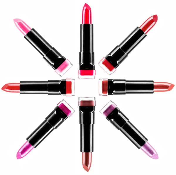 Lipstick colors arranged in a circle and isolated on a white background to form a page border — Stock Photo, Image
