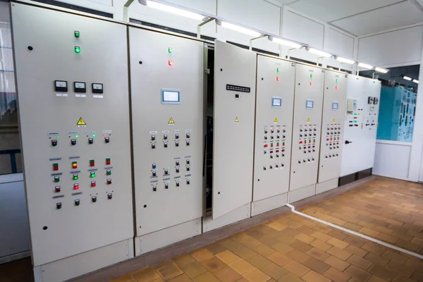 Control panel with circuit-breakers and tangled cable leads, fusebox, electric box, circuit breakers, electrical panel