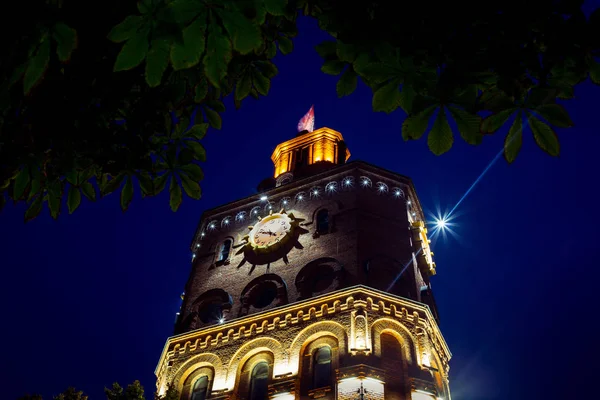 chapel tower, tower in the lights of the night city, town clock, the town at night, Vinnitsa, Europe, European city at night
