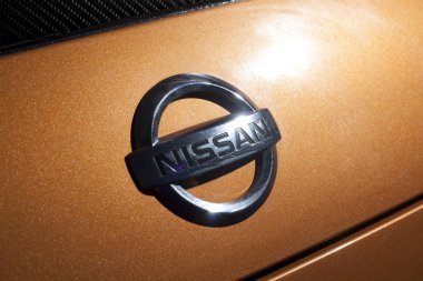 Vinnitsa, Ukraine - April 24, 2012.Logo Nissan 350Z concept car.Sportcar. Photosession,inside the car salon,speedometer, gear box clipart