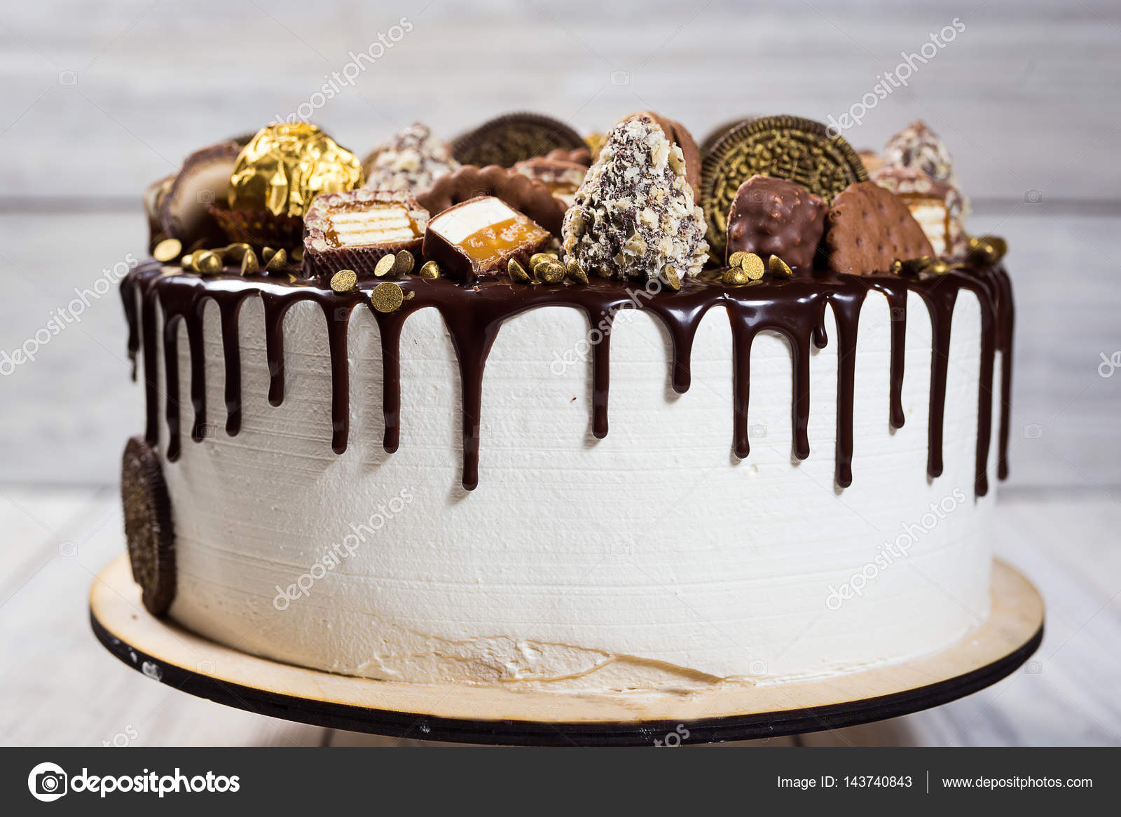 Chocolate Cupcakes Decorated With Candy Cookies And Candy Bars