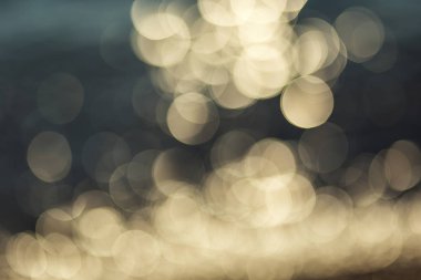 soyut renkli ufuk dairesel facula, arka plan, bulanık bokeh sıcak sesi arka plan: bulanıklık mağaza Dükkanı alışveriş merkezi kavramı: yumuşak odak rüya şehir, altın arka plan içinde ışık