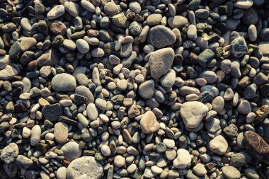 duvar taşları ve deniz, çakıl plaj doku, desen çakıl taş, çakıl plaj, arka plan, gri deniz çakıl kum üzerinde arka plan seyahat kavramı, Türkiye, Florida, Miami gibi