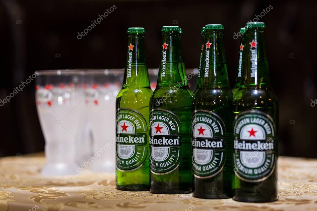 Vinnitsa,Ukraine - August 28,2016.Heineken Lager Beer is the flagship product of Heineken International which owns over 125 breweries in more than 70 countries,Cold bottles of Heineken Lager Beer