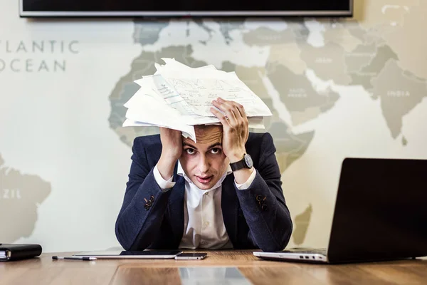 business, people, stress, emotions and fail concept - angry businessman throwing papers in office