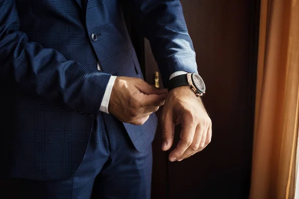 Businessman wears a jacket.Politician, man's style,male hands closeup, American, European businessman, business, fashion and clothing concept — Stock Photo, Image