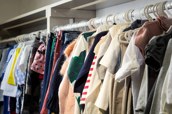 Ropa de moda colgar en una percha — Foto de stock © Forewer #22848360