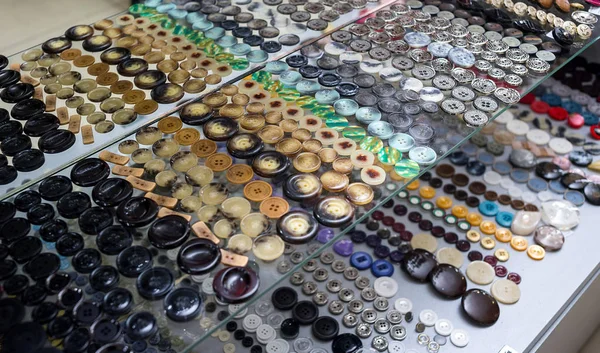 stock image vintage clothes buttons with variety color on sell in market