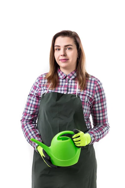 Mujer jardinero profesional o florista en delantal sosteniendo herramientas de jardinería aisladas sobre fondo blanco — Foto de Stock