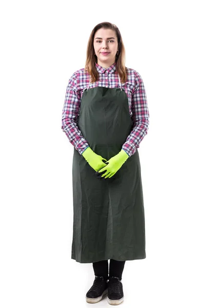 Portrait de femme souriante jardinier professionnel ou fleuriste dans un tablier isolé sur fond blanc — Photo