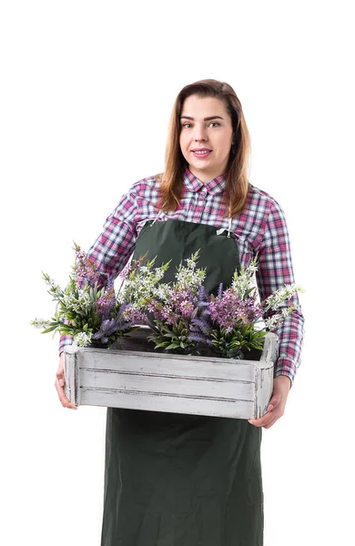 Kwiaciarnia w fartuch gospodarstwa kwiaty w doniczce na białym tle lub kobieta profesjonalny ogrodnik — Zdjęcie stockowe