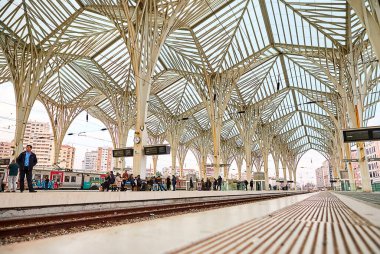LISBON, PORTUGAL - DECEMBER 14, 2018: Modern architecture at the Oriente Train Station (Gare do Oriente) designed by famous architect Santiago Calatrava, built in 1998 clipart
