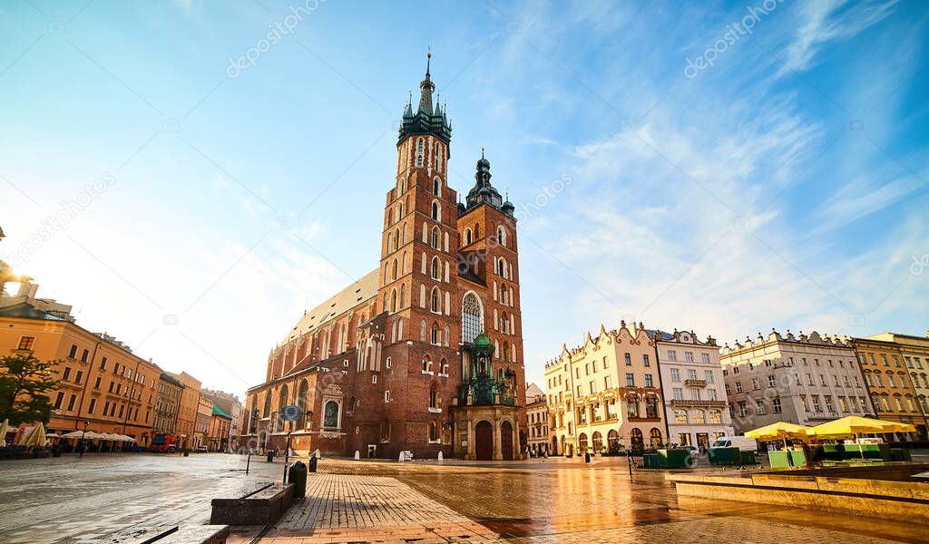 St. Mary's Basilica on the Krakow Main Square (Rynek Glowny) during the sunrise, Poland