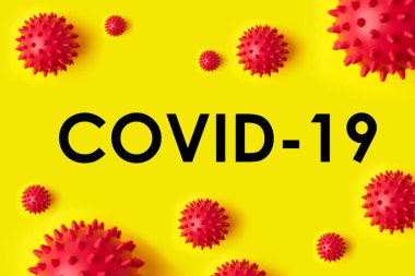 Sarı arka planda COVID 19 yazılıydı. Dünya Sağlık Örgütü WHO, Çin virüsü 202 için yeni bir resmi isim tanıttı