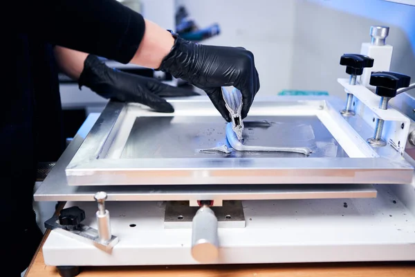 Engineer factory worker electronics works with a chip (board). Microchip Production, Nano computer Technology and manufacturing technological process