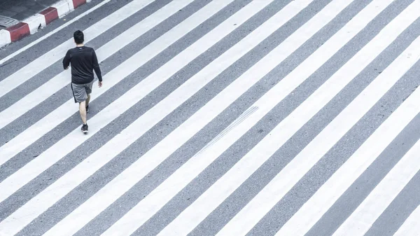 top view of person walk on the landscape pattern street