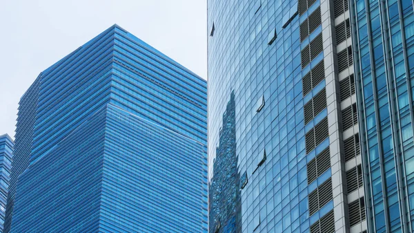 Padrão exterior parede de vidro azul edifícios modernos — Fotografia de Stock