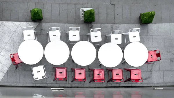 top view of white circle table and chairs at outdoor