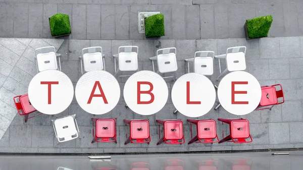 top view of white circle table and chairs at outdoor with word \