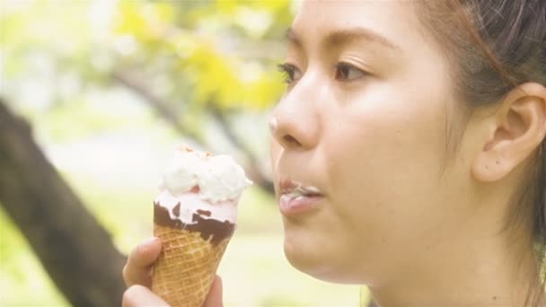 Young Woman Eating Ice Cream Garden Park Outdoors Summer Sunshine — Stock Video