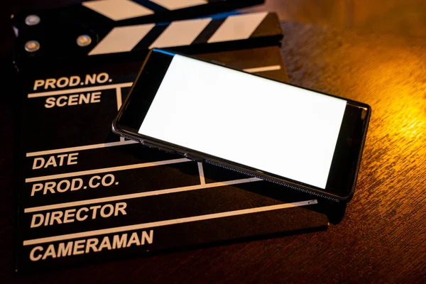 Mobile Phone Empty White Bright Screen Movie Clapper Board Concept — Stock Photo, Image