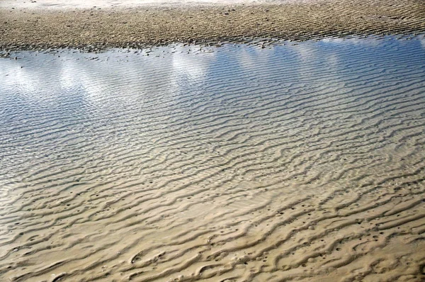 Texturas e reflexões em areia — Fotografia de Stock