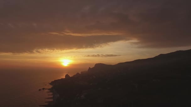 Vista aérea de la puesta del sol sobre el horizonte — Vídeos de Stock