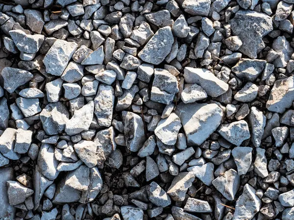 Superfície de seixos rochosos, fundo de pedra — Fotografia de Stock